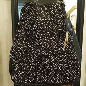 Carlos Santana black purse